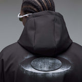 WintertideScratchedHoodie-A black pullover hoodie with a small white Oakley logo on the left chest, displayed against a neutral gray gradient background.