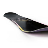 Wonder- Black snowboard with a multi colored design in the center shown on a white background