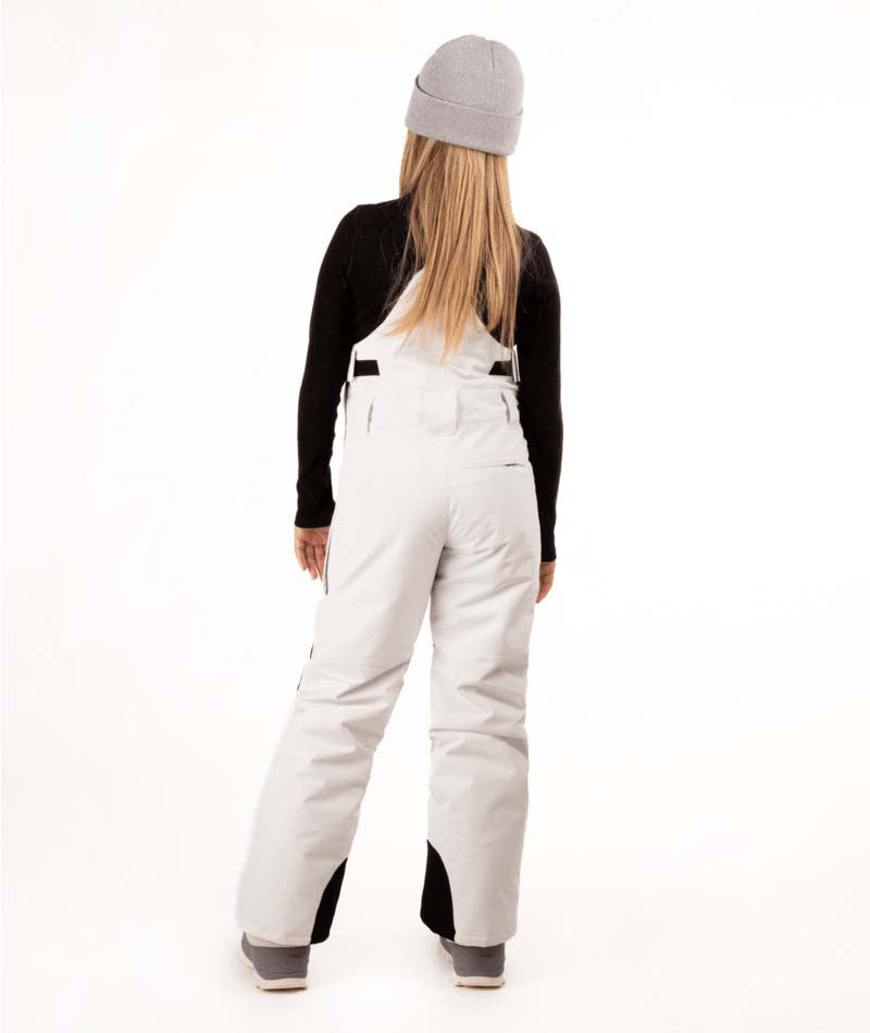 YouthCooperBib-Person wearing a black long-sleeve shirt, gray beanie, white bib overalls, and gray shoes on a white background
