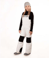 YouthCooperBib-Person wearing a black long-sleeve shirt, gray beanie, white bib overalls, and gray shoes on a white background