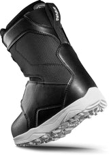 YouthLashedBoa-Black snowboard boot with white sole on a white background