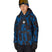 YouthWaterproofHoody-Child wearing a blue and black patterned jacket with goggles on a white background