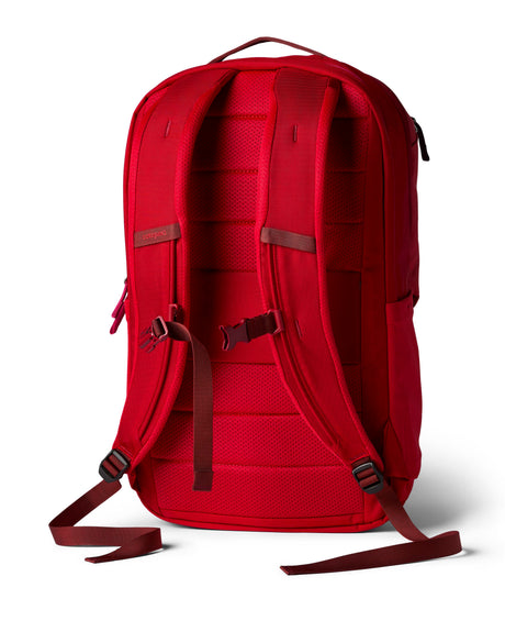 allpa-26l-daypack-A red Cotopaxi backpack with a matte finish, featuring a top zippered compartment, a main compartment, and a front zippered pocket. The brand logo is printed in orange on the front center.
