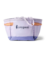 allpa-30l-gear-hauler-A Cotopaxi brand canvas tote bag in light lavender purple with a darker purple bottom panel, orange side accents, and white handles, shown on a clean white background.