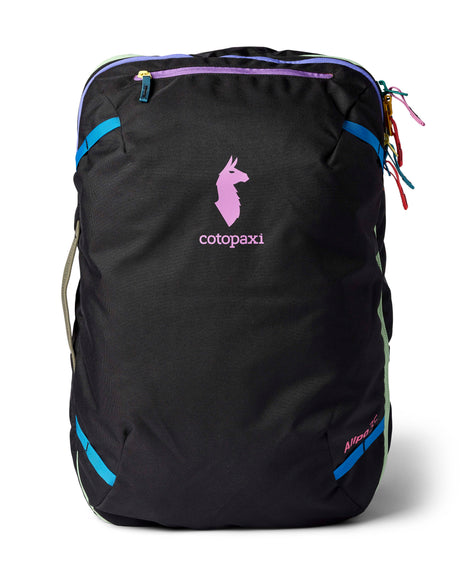 allpa-35l-travel-pack-A black Cotopaxi backpack with a pink llama logo on the front, accented with bright blue, purple, and multicolor zipper details, shown on a white background.