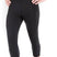 3/4pant- Person wearing black athletic leggings on a white background